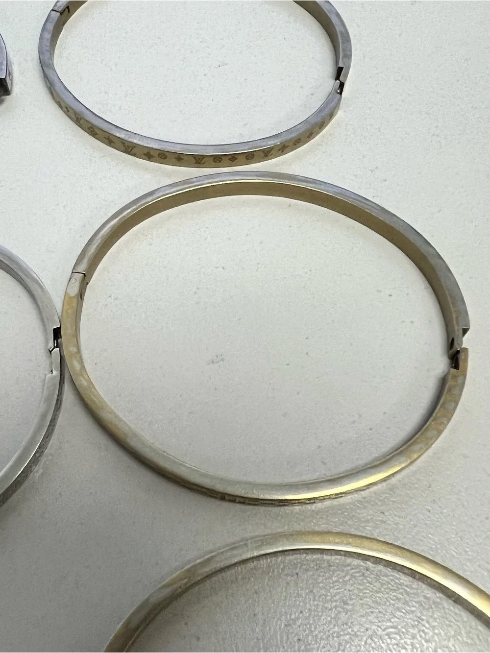 Chanel, LV, Gucci Stackable Silver and Gold Logo Bangle Set - Picture 16 of 16